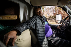 Juan Reid of Tightshift Laboring Cooperative in his van