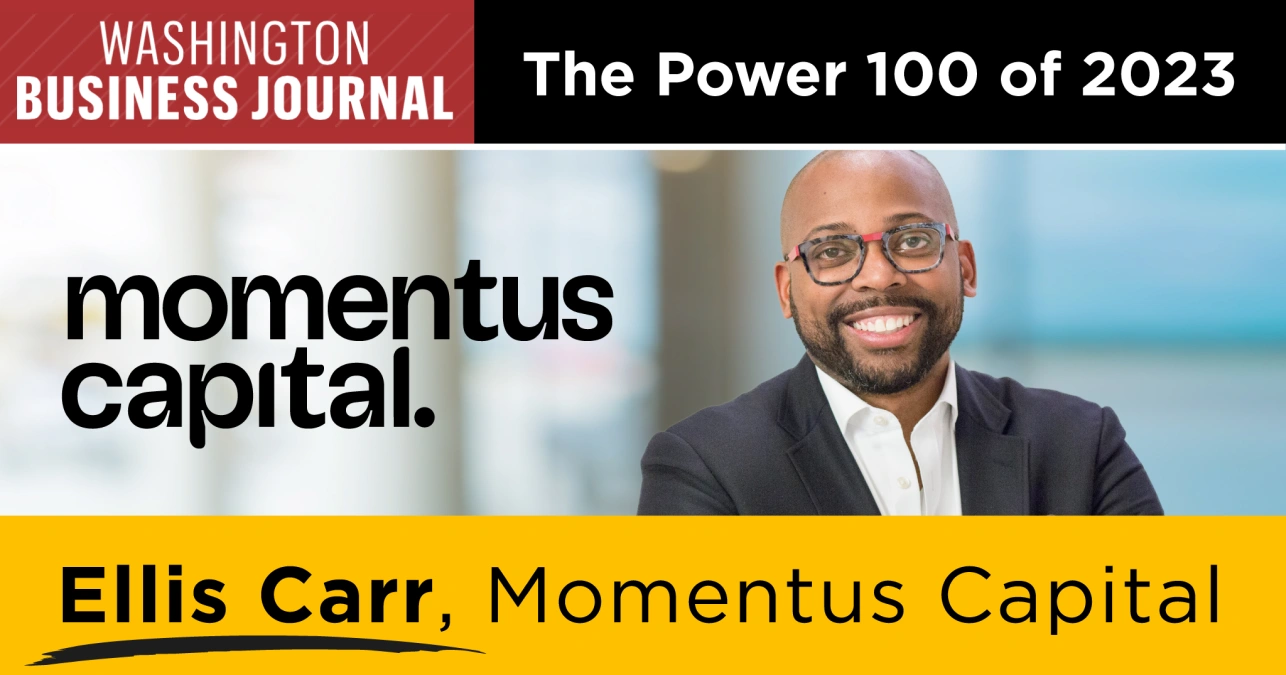 A graphic featuring the logo of the Washington Business Journal, the words "The Power 100 of 2023," the logo for Momentus Capital, a smiling photo of Ellis Carr dressed in a suit with a pair of glasses, and the words "Ellis Carr, Momentus Capital".